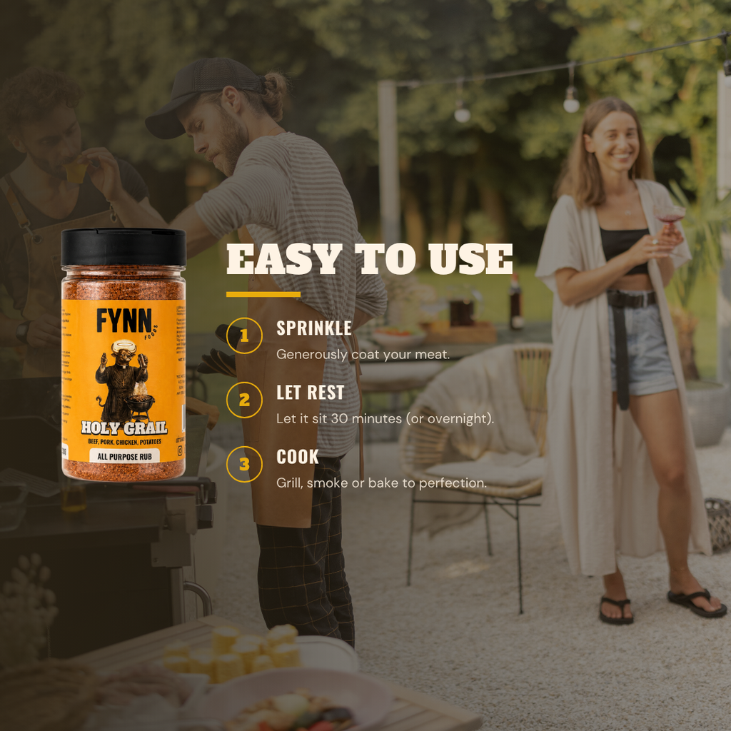 A jar of Fynn Holy Grail All Purpose Rub is shown in the foreground on a patio with people cooking and dining in the background, accompanied by an 'Easy to Use' instruction overlay.