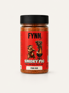 A bottle of Fynn Smoky Pig Pork Rub seasoning, featuring a red label with a cartoon pig grilling and a black lid, set against a plain light background.