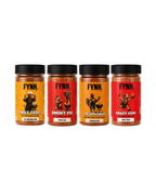 Four jars of Fynn brand hot sauce arranged in a row on a plain white background. The labels are red and orange with black lids, and the visible flavors are Holy Grail, Smokey Pig, The Wingman, and Crazy Cow.